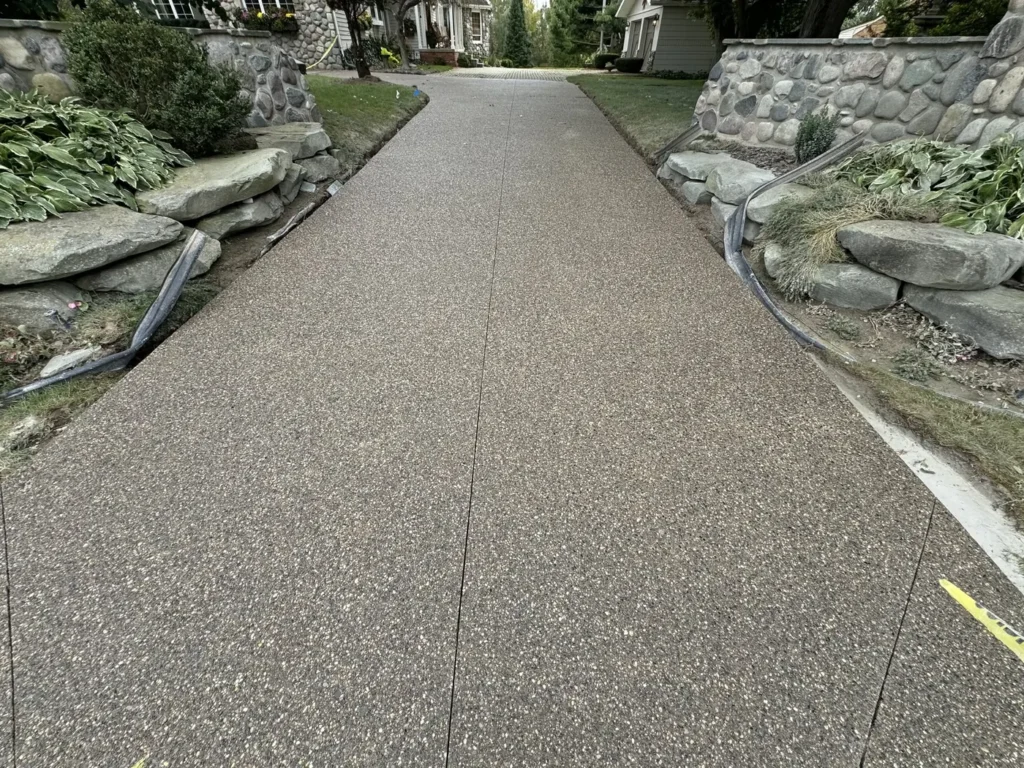 After: new exposed aggregate concrete driveway in Ann Arbor, MI