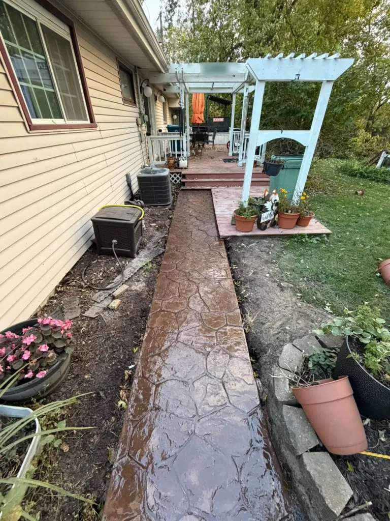 After: colored and sealed stamped concrete walkway in Ann Arbor, MI