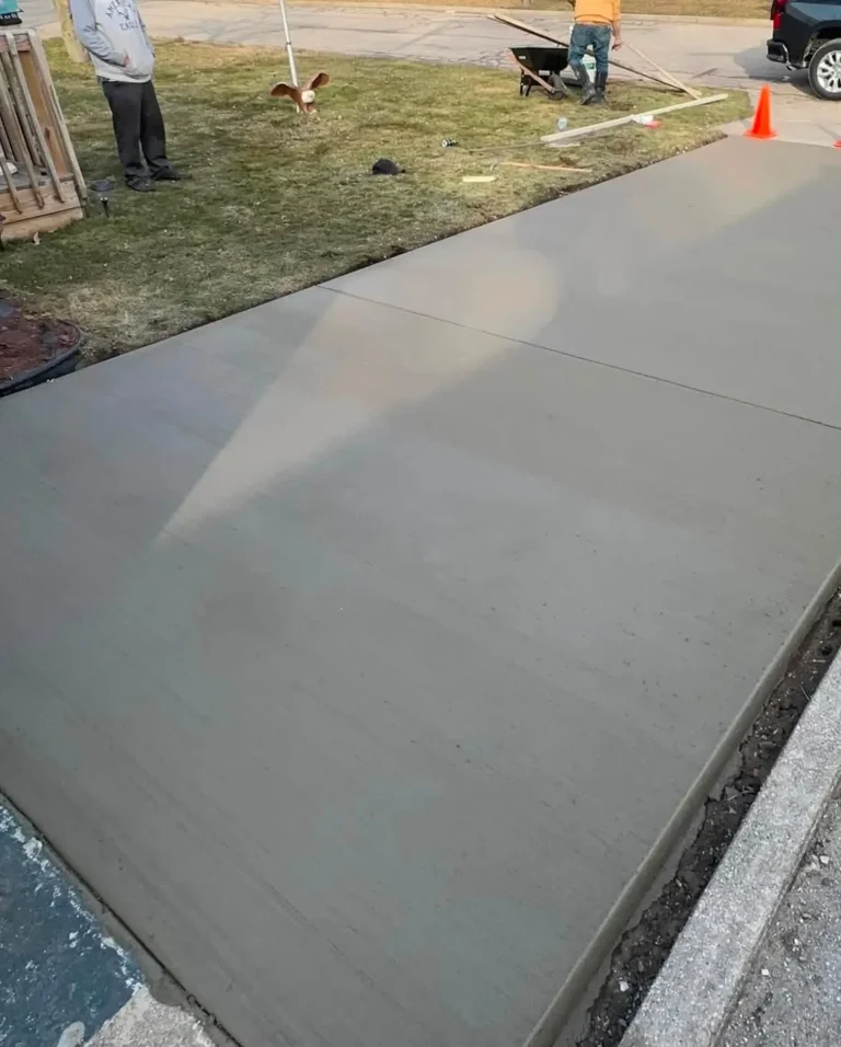 Broom finish concrete driveway with control joints in Lansdowne, Ann Arbor MI