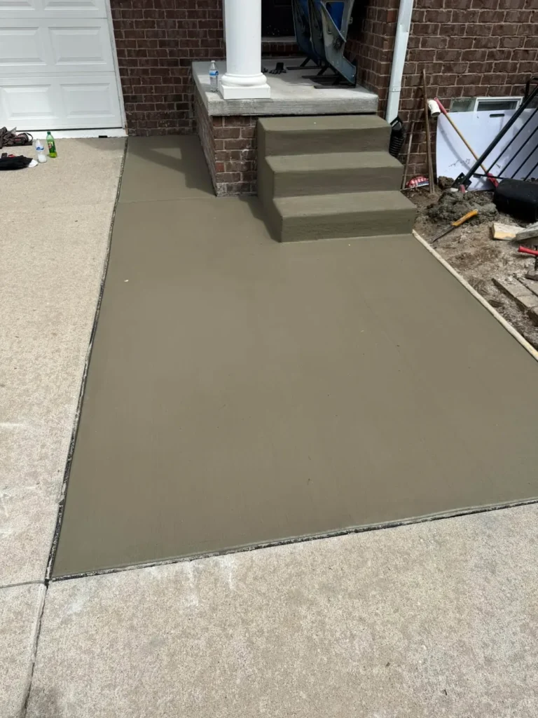 New concrete front steps and walkway at a brick home in Ann Arbor, MI