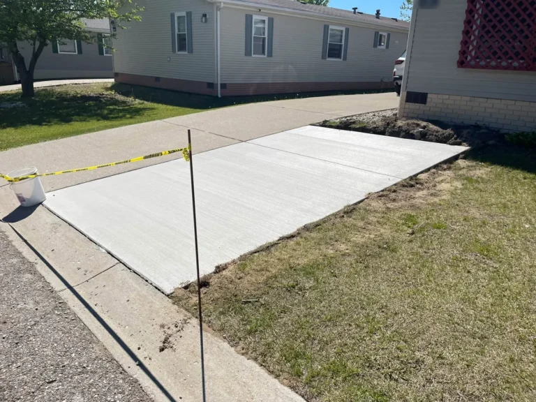 New concrete parking pad added to a driveway in Ann Arbor, MI