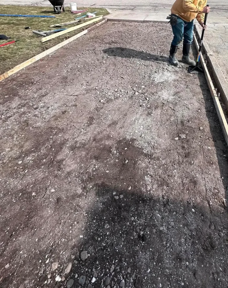 Compacted gravel base and forms for a concrete driveway in Lansdowne, Ann Arbor MI