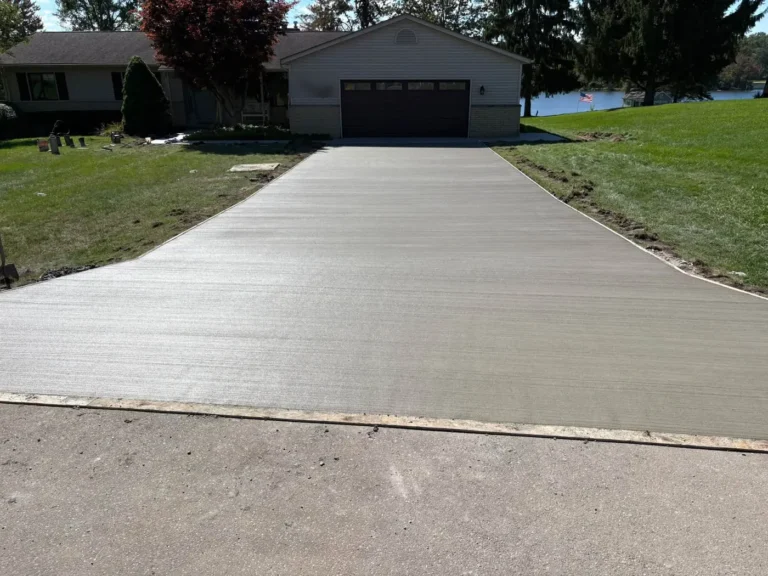 New broom finish concrete driveway at a lakeside home near Ann Arbor, Michigan