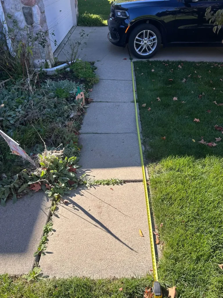 Old cracked concrete walkway before replacement in Georgetown, Ann Arbor MI