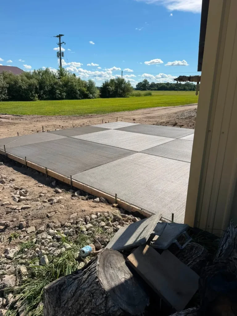 Concrete apron slab beside a pole barn in Huron Hills, Ann Arbor MI